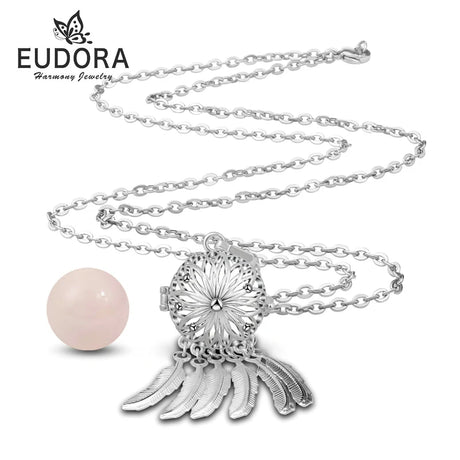 Silver necklace with a pink pendant on a white background, featuring the Eudora brand.