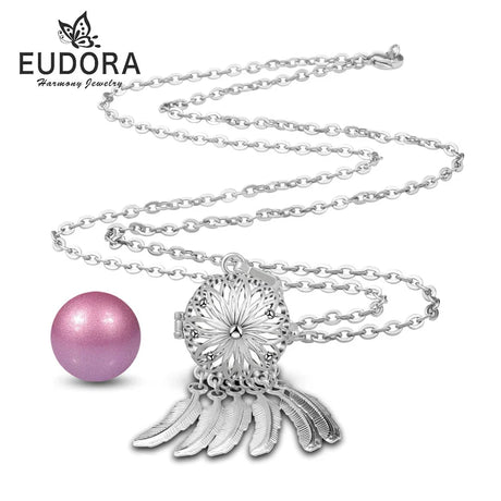 Silver necklace with pink pendant on a white background, featuring the Eudora brand.
