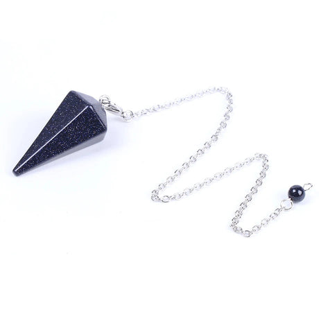 Black stone pendant on a silver chain with a white background