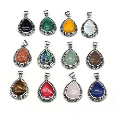 Collection of colorful teardrop pendants on a white background