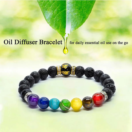Colorful beaded oil diffuser bracelet with a green leaf in the background