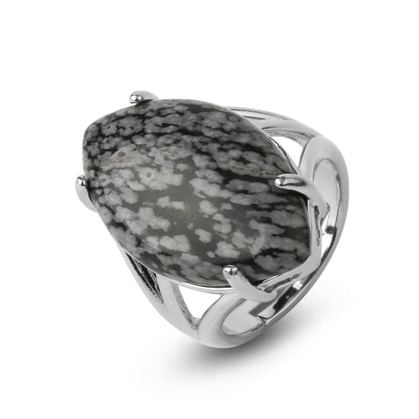 Silver ring with a large gray stone on a white background