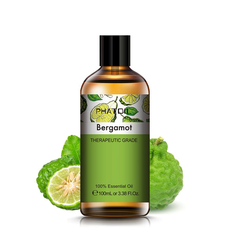 Bottle of Phat Oil Bergamot essential oil with a green label and bergamot fruit graphics on a white background.