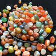 Colorful marbled stones on a dark background