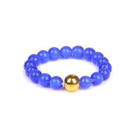Blue beaded bracelet with a gold bead on a white background