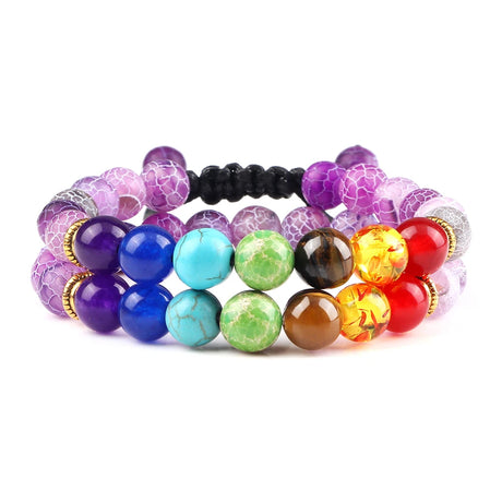 Set of colorful beaded bracelets on a white background