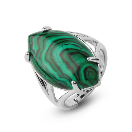 Silver ring with a green stone on a white background