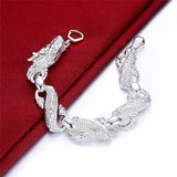 Silver bracelet on a red and white background