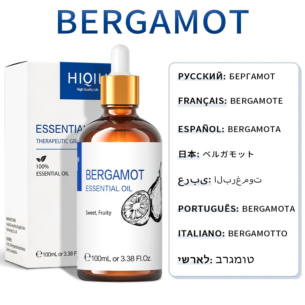 Bergamot essential oil bottle with dropper and packaging on a white background