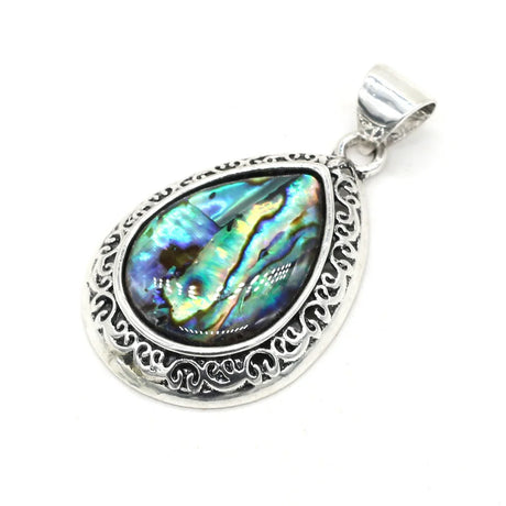 Silver pendant with a colorful stone on a white background