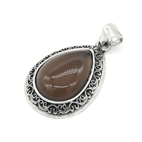 Silver pendant with a brown teardrop-shaped gemstone on a white background