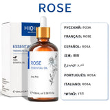 Rose essential oil bottle with dropper and packaging on a white background
