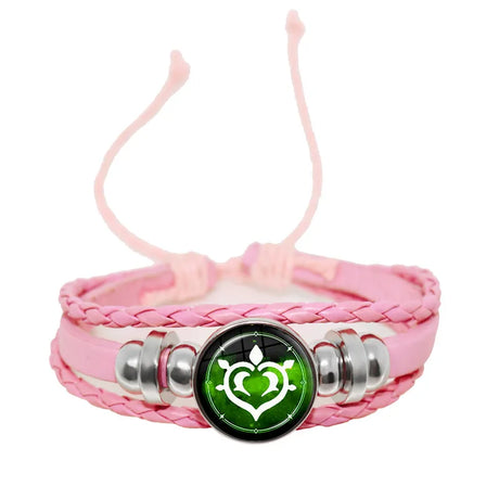 Pink braided bracelet with a green heart-shaped charm on a white background