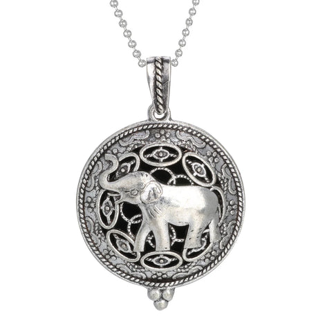 Silver elephant pendant necklace on a white background