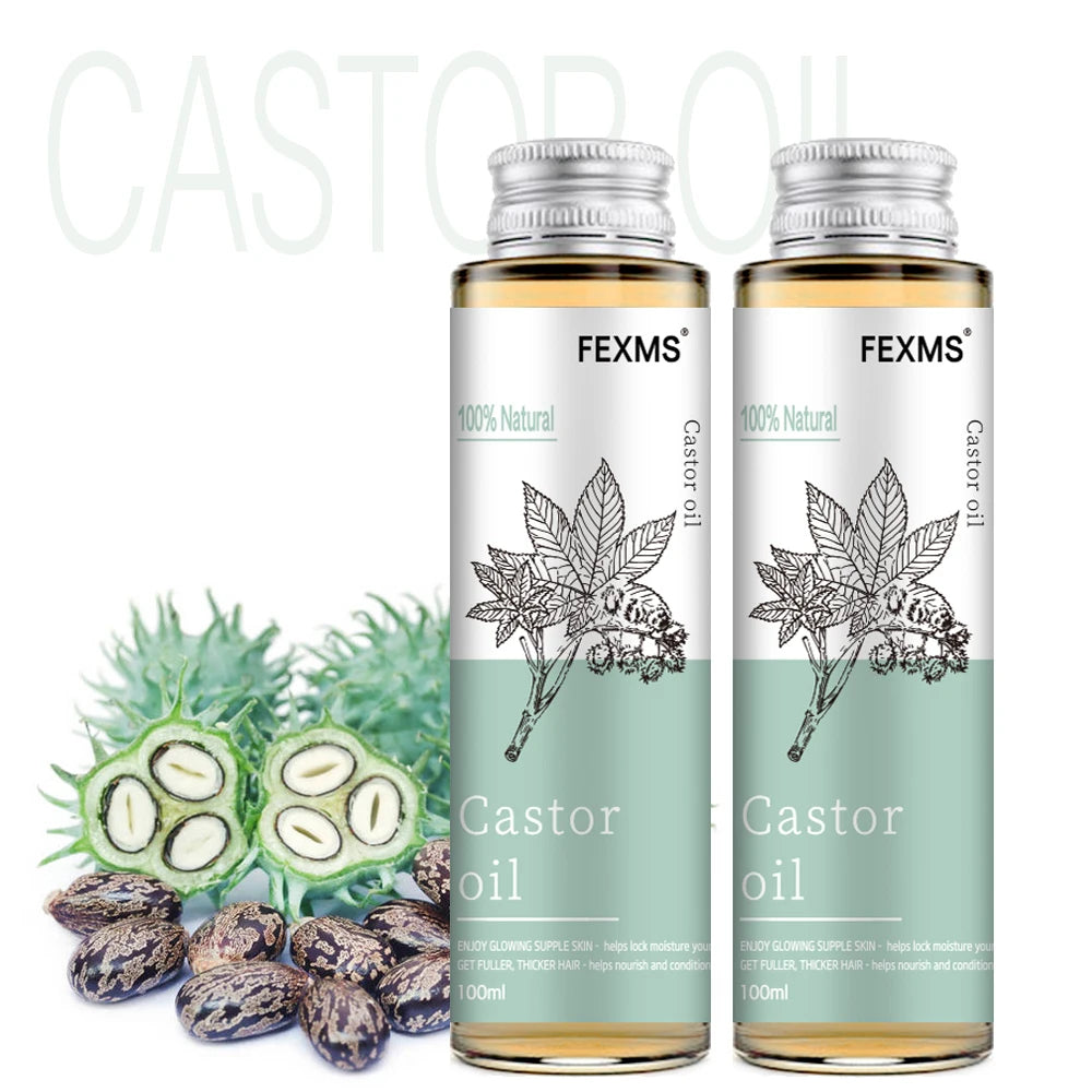Two bottles of FEXMS Castor Oil with castor seeds and seeds pod on a white background
