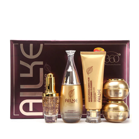 AILKE skincare product set with bottles and a box on a white background