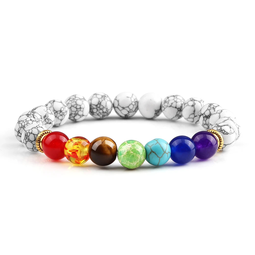 Colorful beaded bracelet with white stone-like ends on a white background