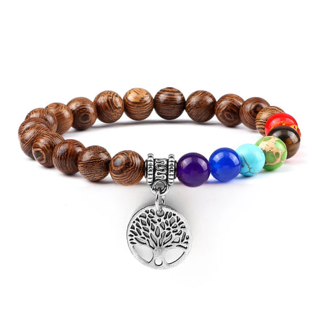 Bracelet with wooden beads and colorful stones on a white background