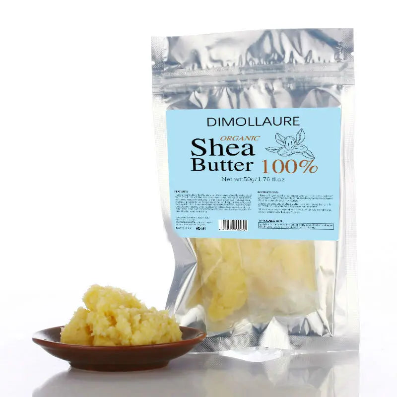 Shea butter with a package labeled 'DIMOLLAURE Organic Shea Butter 100%' on a white background