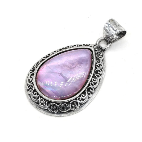 Silver pendant with a pink teardrop-shaped gemstone on a white background