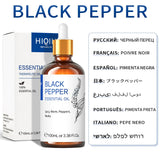 Black Pepper essential oil bottle with dropper and packaging on a white background