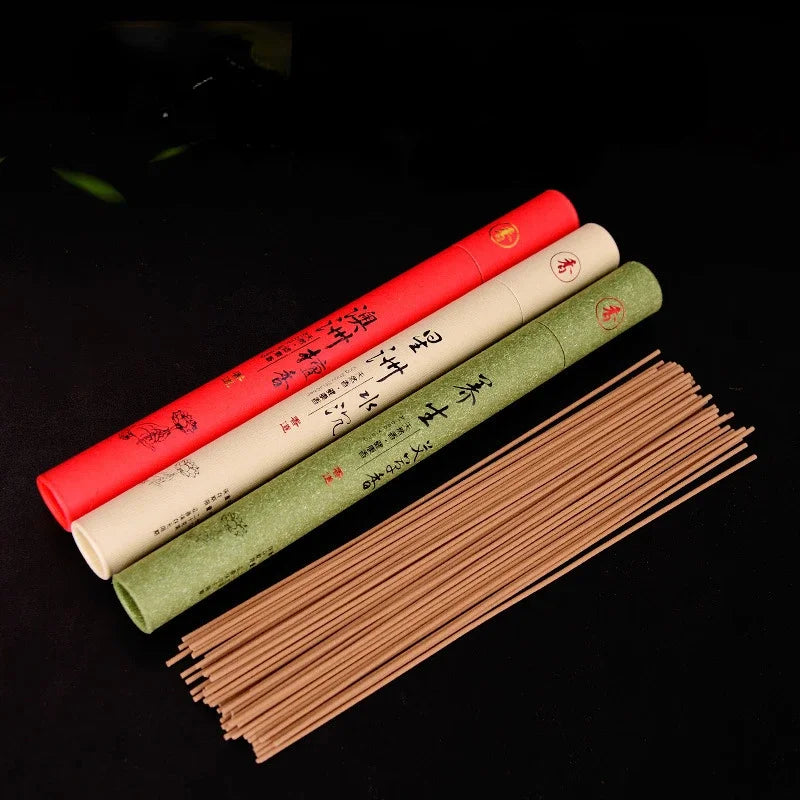 Incense sticks in different colored packaging with incense sticks in front on a black background