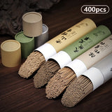 Incense sticks in paper tubes on a wooden surface with '400pcs' text above.