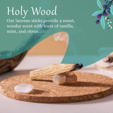 Incense sticks on a wooden coaster with a green background and text about the scent.