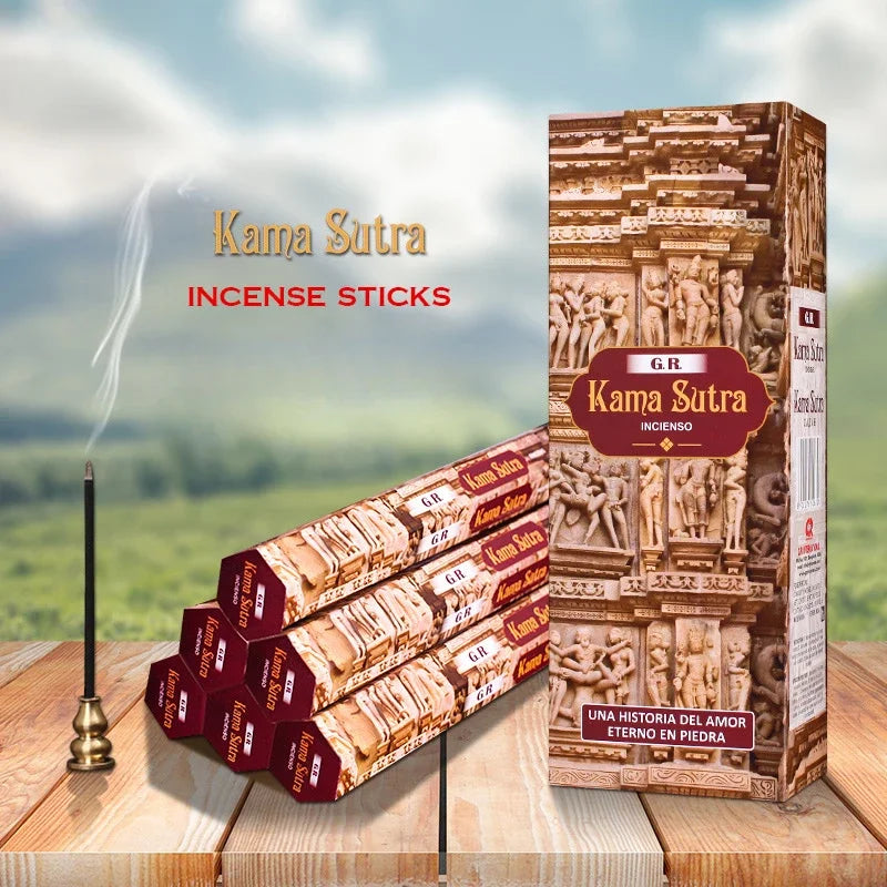 Kama Sutra incense sticks with packaging on a wooden surface and scenic background