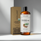 MayJam fractionated coconut oil bottle and packaging on a gray background
