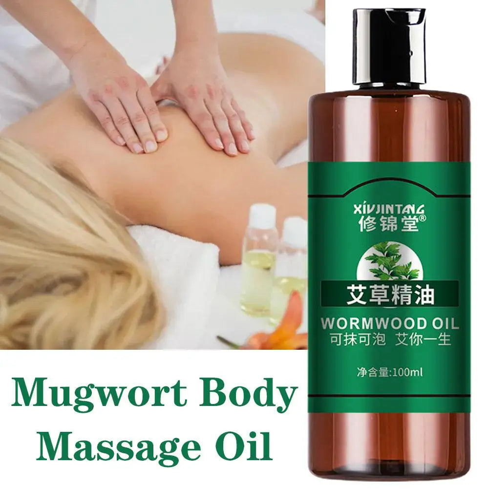 Mugwort body massage oil with a person receiving a massage in the background