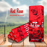 Red Rose incense sticks packaging with a scenic background