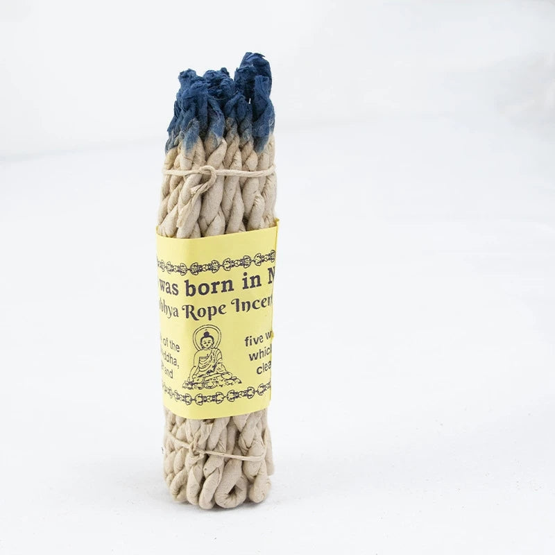Rope incense with a yellow label on a white background