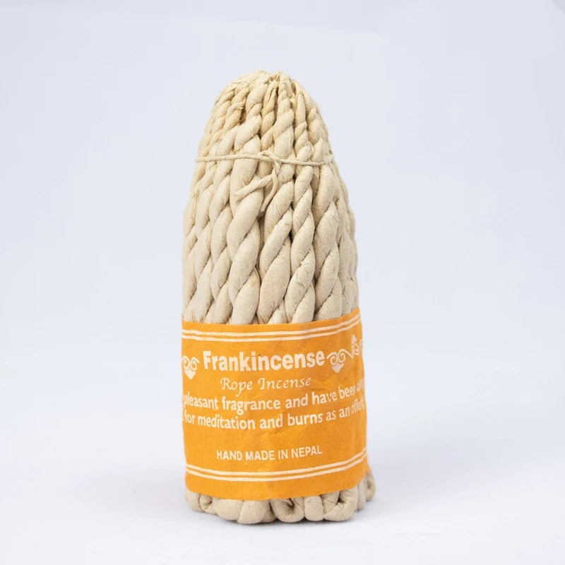 Rope incense with an orange label on a white background