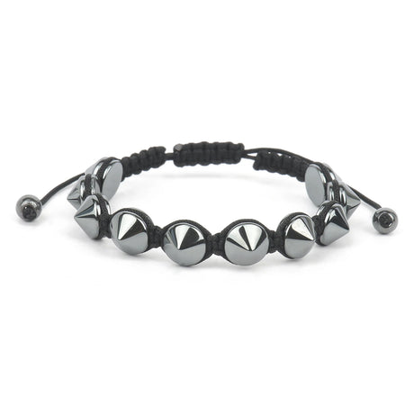 Black braided bracelet with silver pyramid beads on a white background