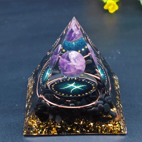 Crystal pyramid with purple stones on a dark background
