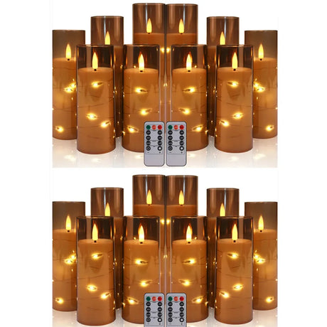 Set of brown LED candles with remote controls on a white background