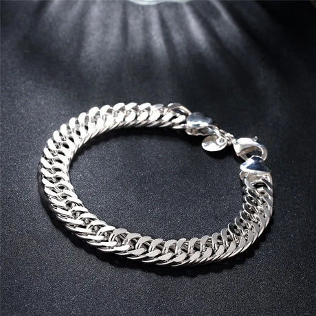 Silver chain bracelet on a dark background