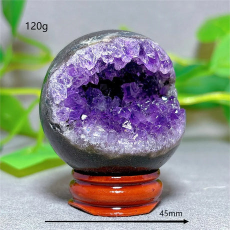 Amethyst geode on a wooden stand with measurements and weight displayed