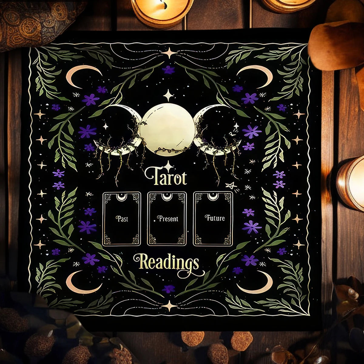 Decorative mat with tarot design featuring moon, stars, and cards on a dark background.