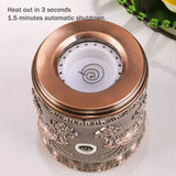 Decorative heat lamp with metallic design on a white background