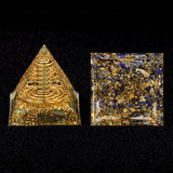 Two crystal pyramids on a black background