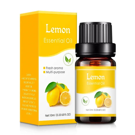 Lemon essential oil bottle and packaging on a white background