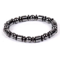 Black beaded bracelet on a white background