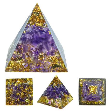 Set of crystal pyramids with purple and gold colors on a white background