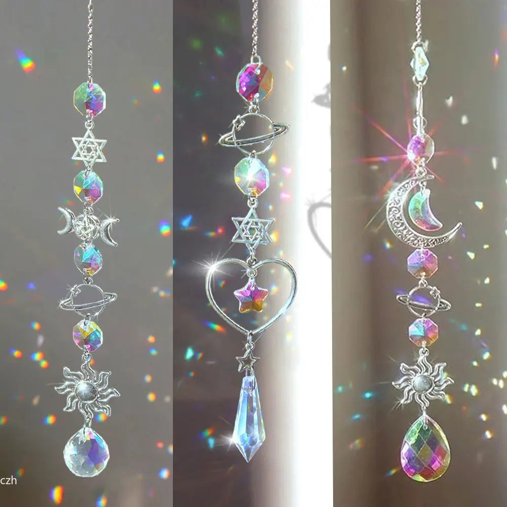 Decorative hanging crystal with celestial designs on a blurred background