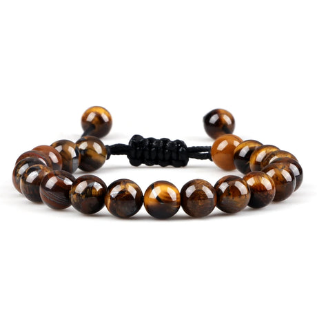 Beaded bracelet with brown tiger eye stones on a white background