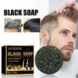 Black soap bar with packaging and a man using it on his hair.