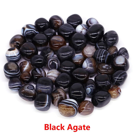 Collection of black agate stones on a white background with 'Black Agate' text.