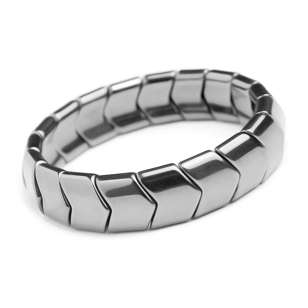 Silver bracelet with a geometric pattern on a white background
